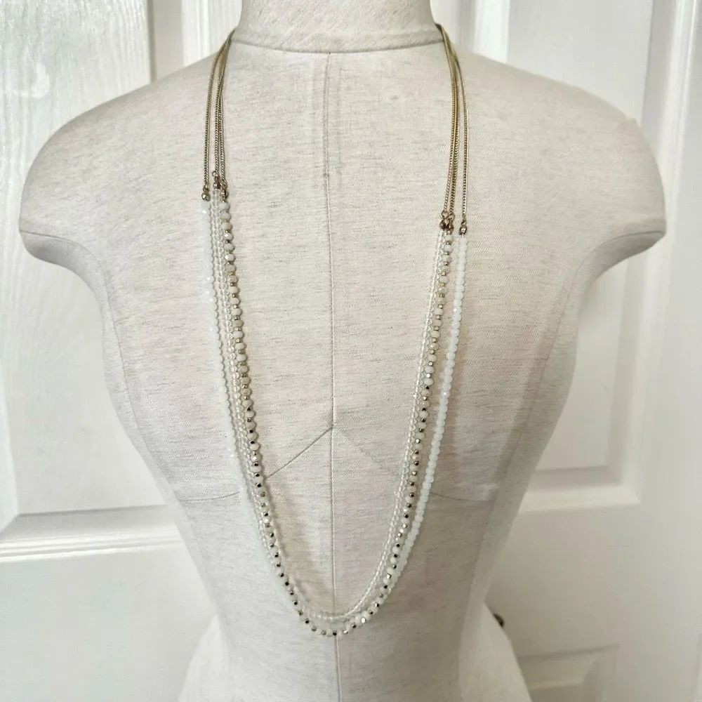 Long white gold multi strand necklace